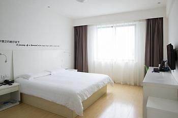 Motel 168 Shanghai Nanhui Huinan Subway Station Экстерьер фото